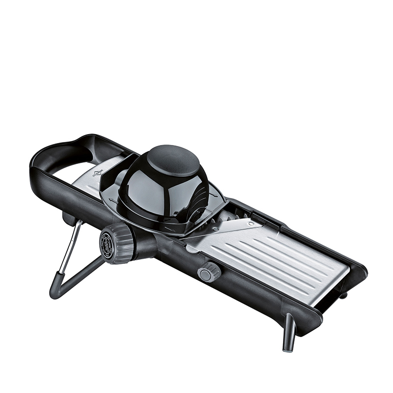 Black vegetable slicer with safety holder and stand