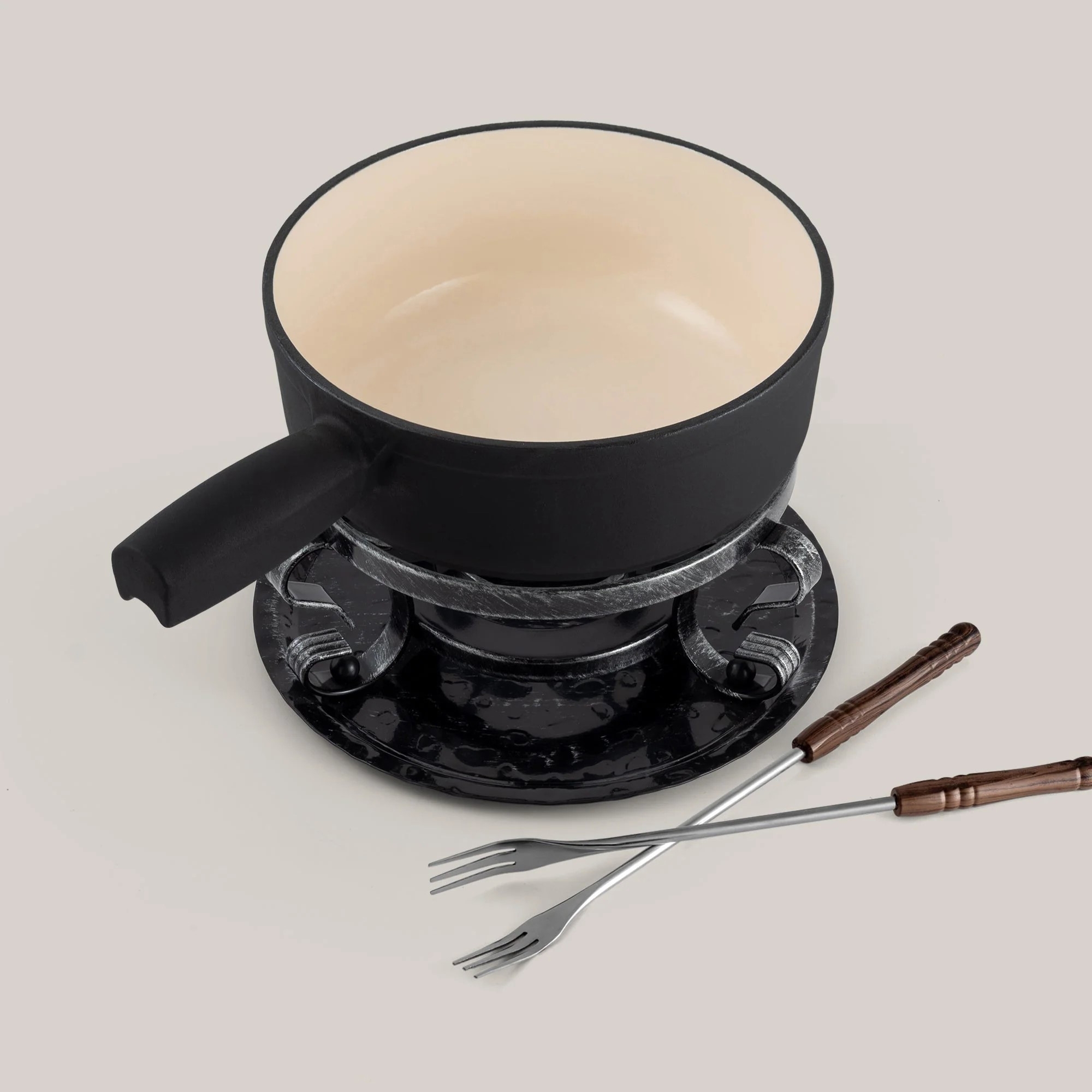 Black cast iron fondue set with two forks