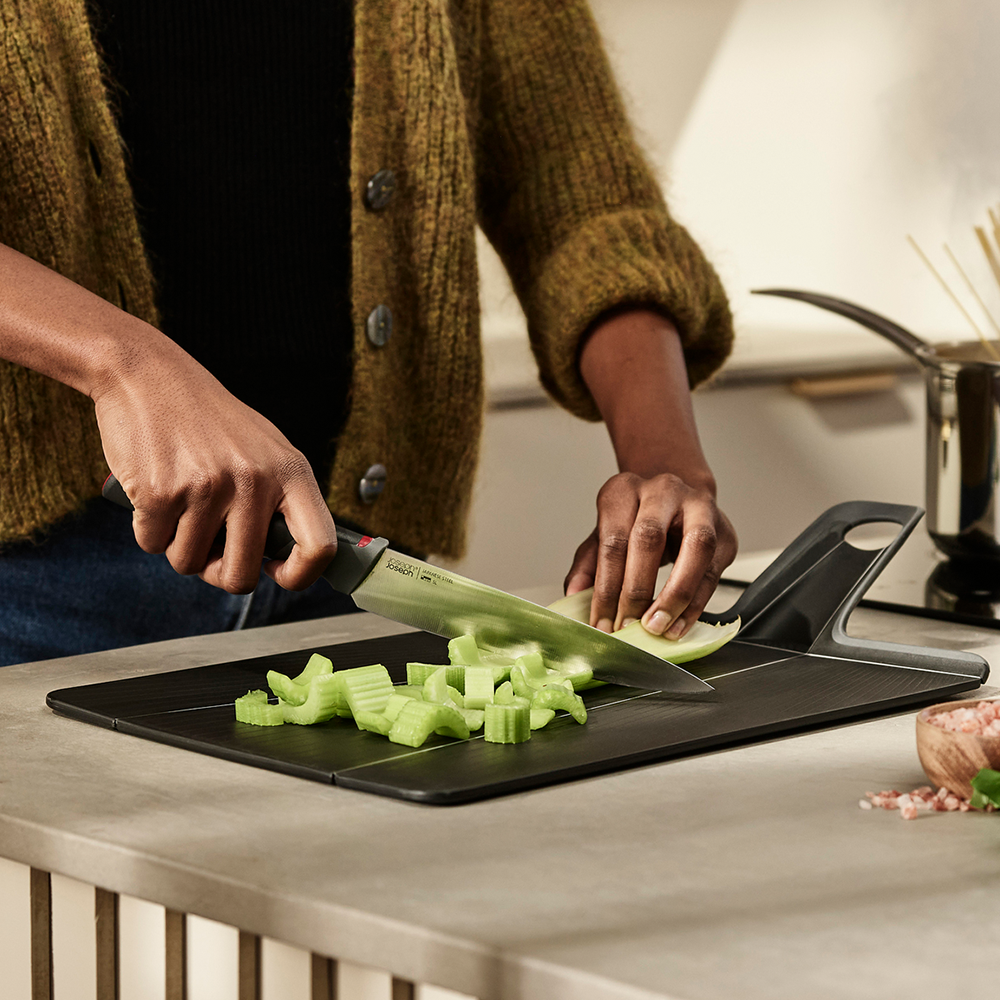 Folding Chop2Pot Plus chopping board by Joseph Joseph