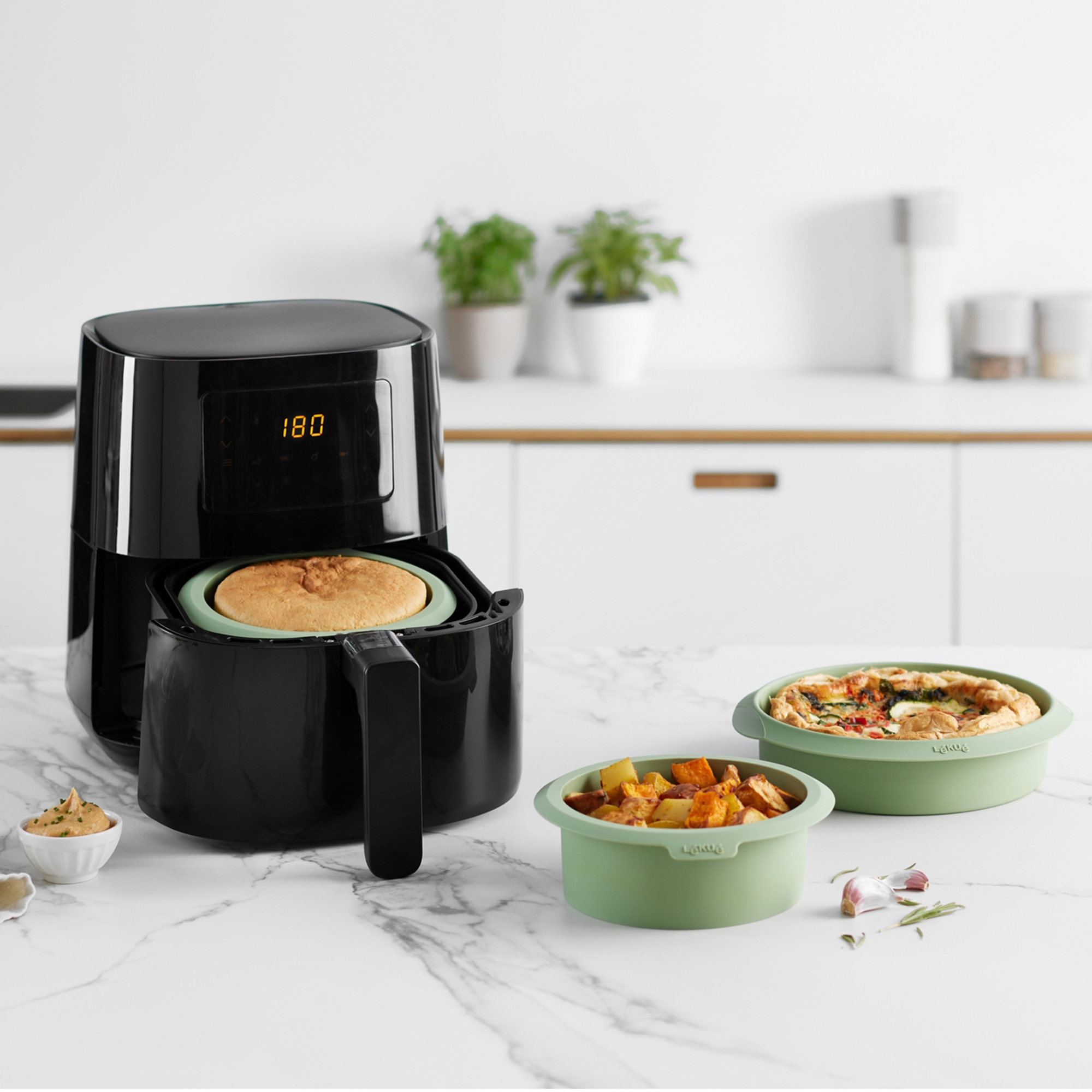 Silicone baking pans with food in air fryer