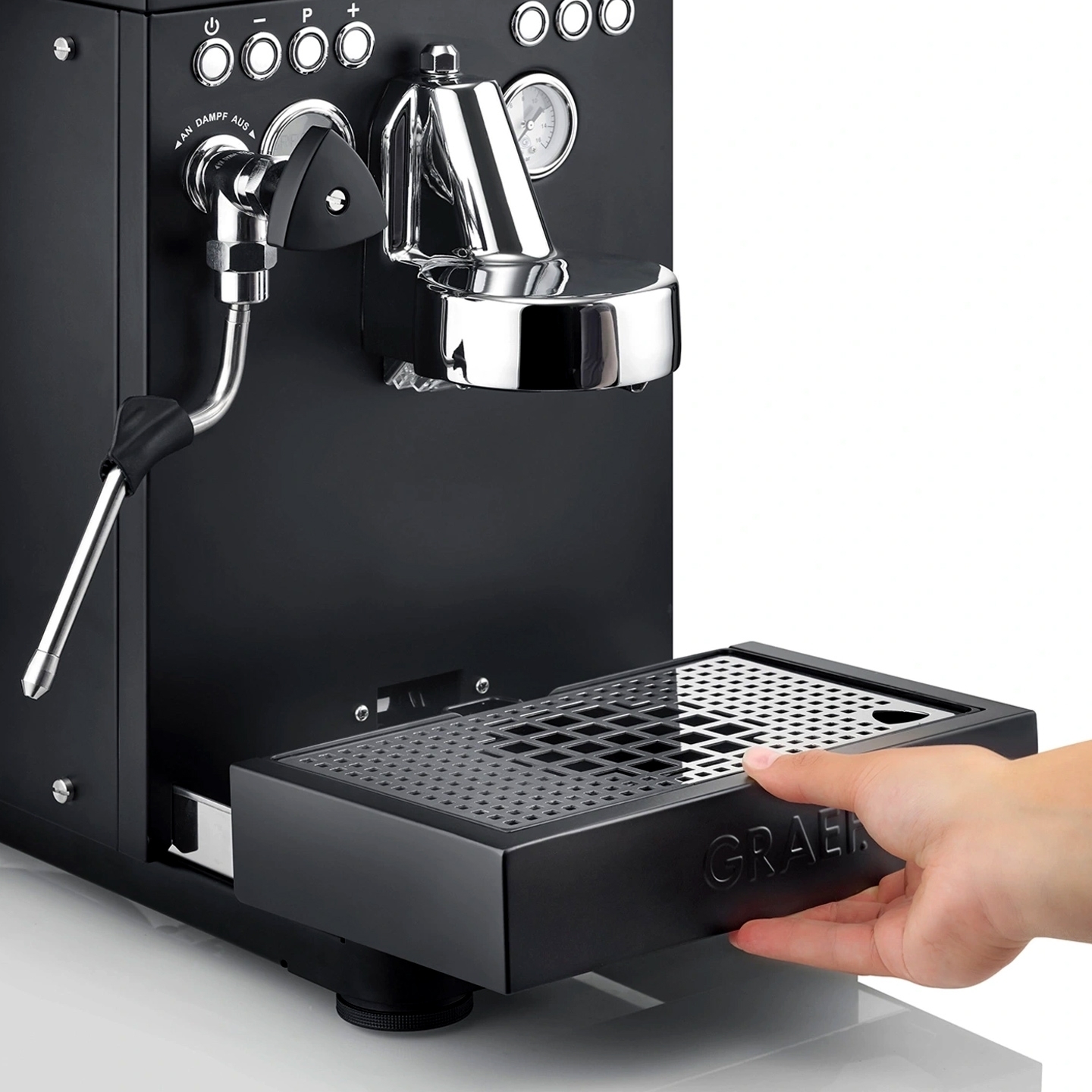 Hand operating drip tray on Graef portafilter machine