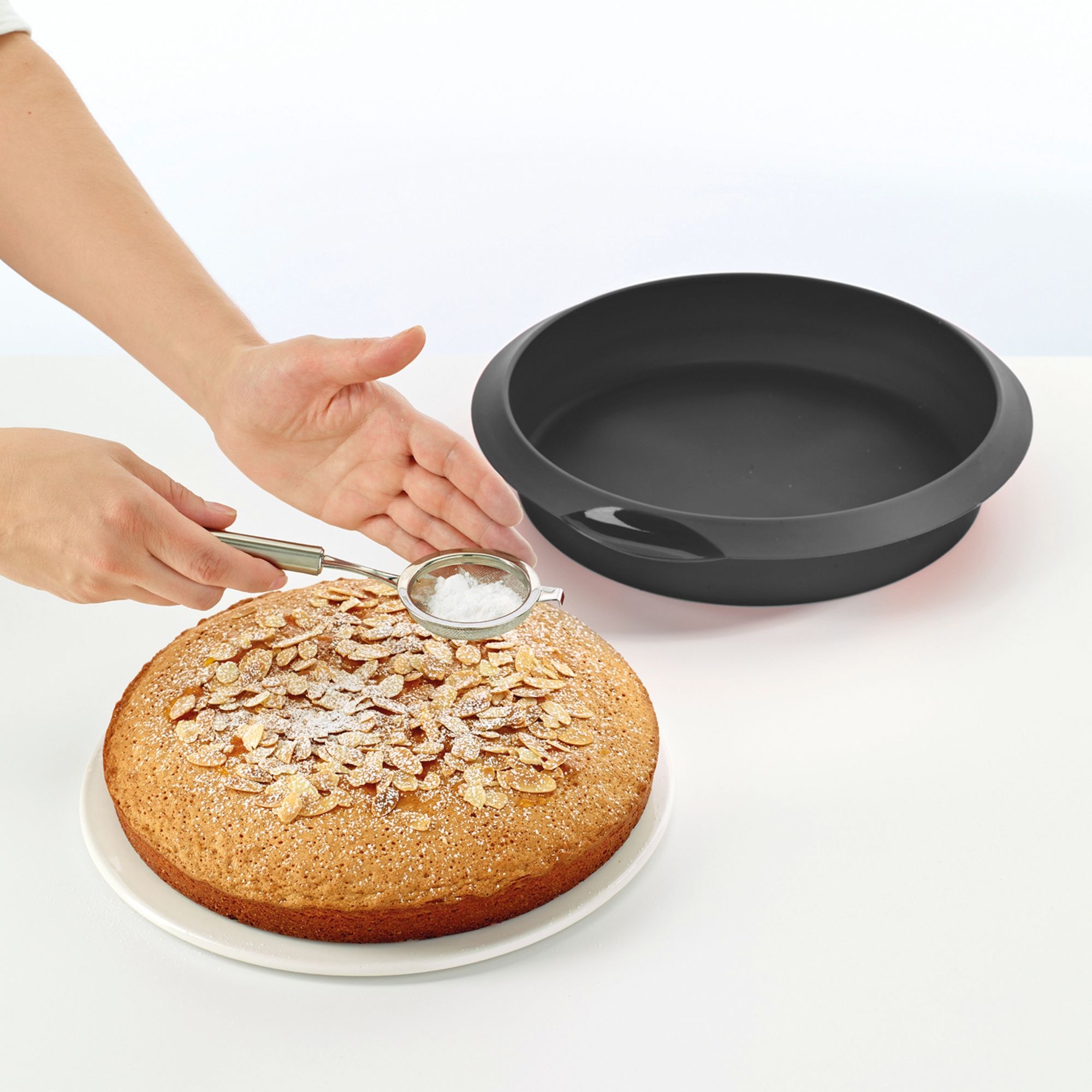 Lékué - Round silicone cake tin, 24 cm, black