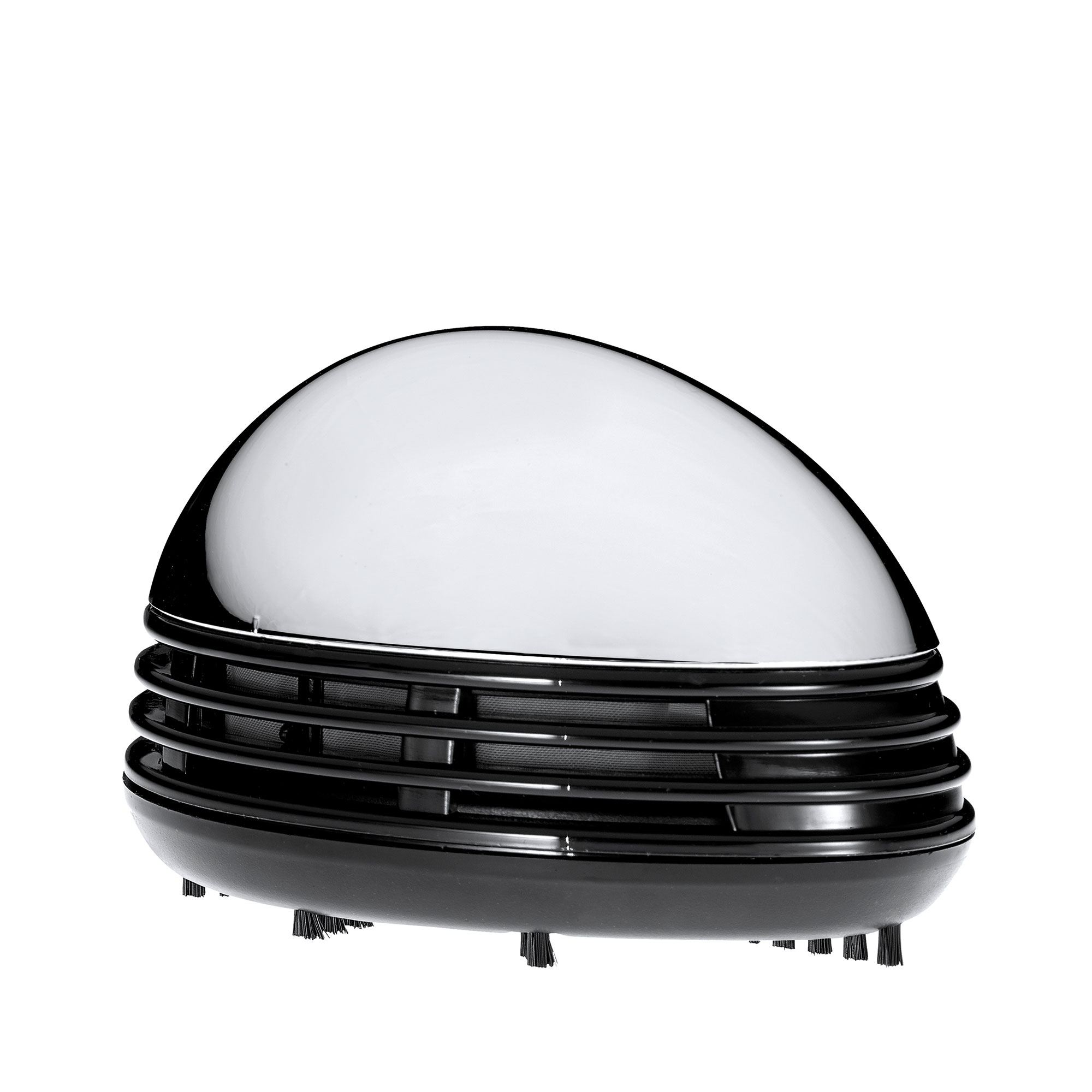 Compact black tabletop vacuum cleaner with brushes