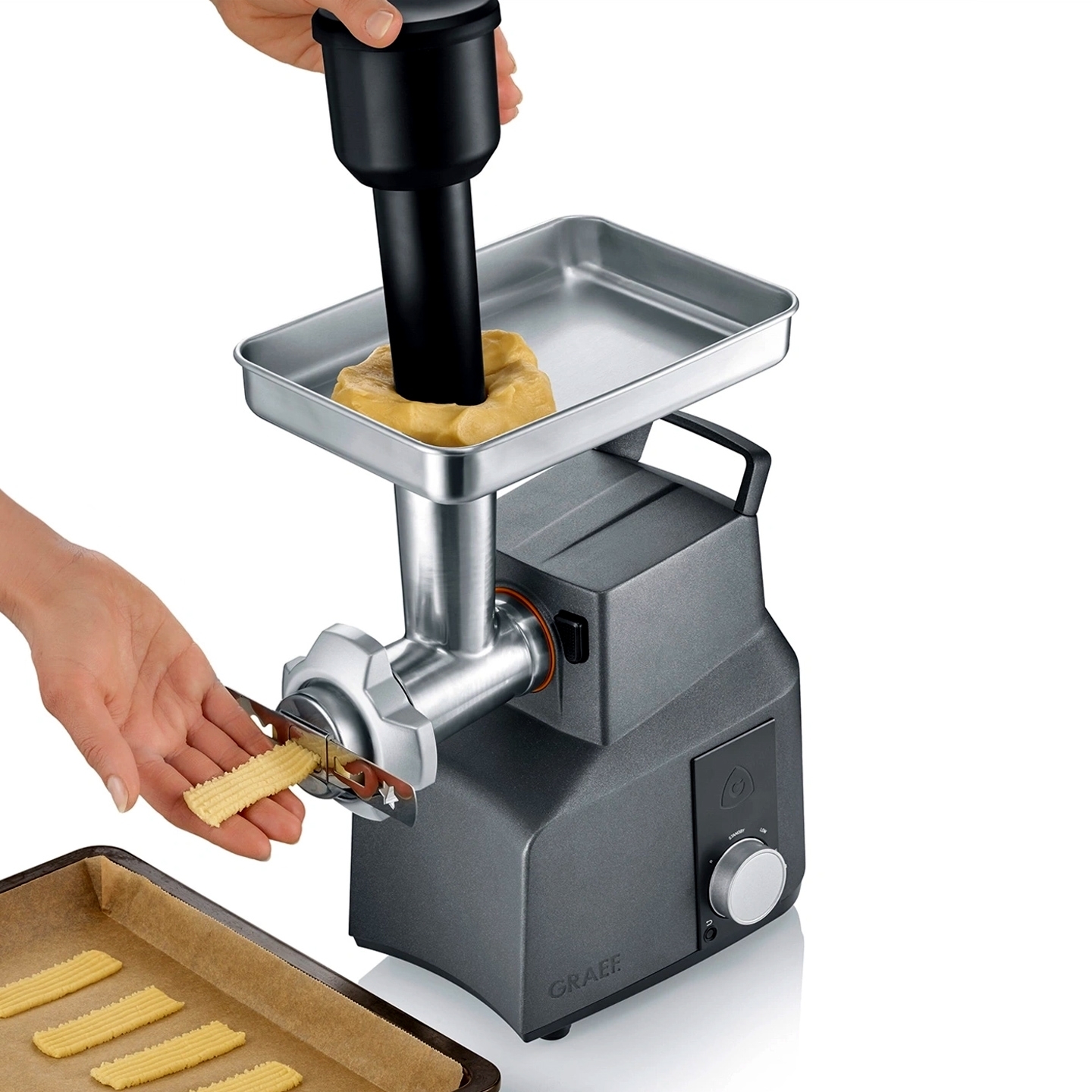 Electric meat grinder shaping cookie dough