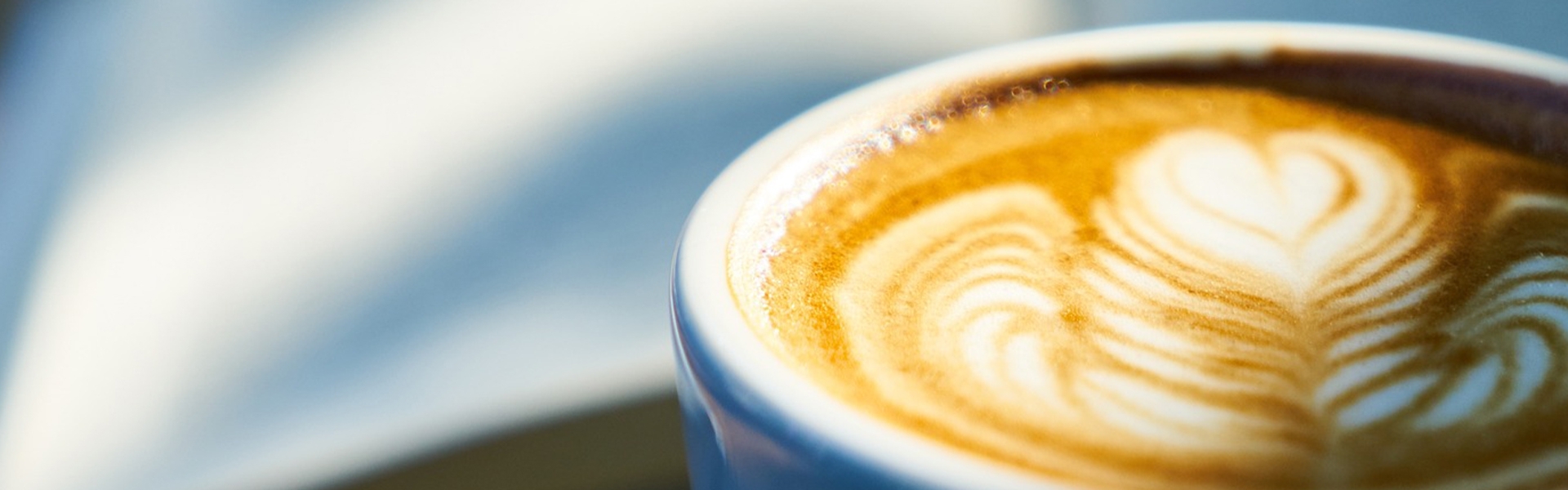 Close-up of cappuccino with latte art heart