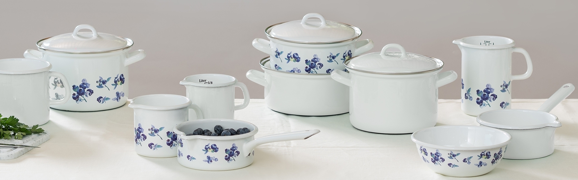 White enamel cookware with blueberry design