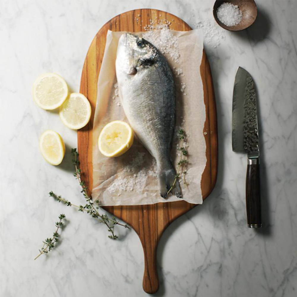 TeakHaus - Canoe Collection Boards - Teak cutting board with handle TeakHaus - Canoe Collection Boards - Teak cutting board with handle