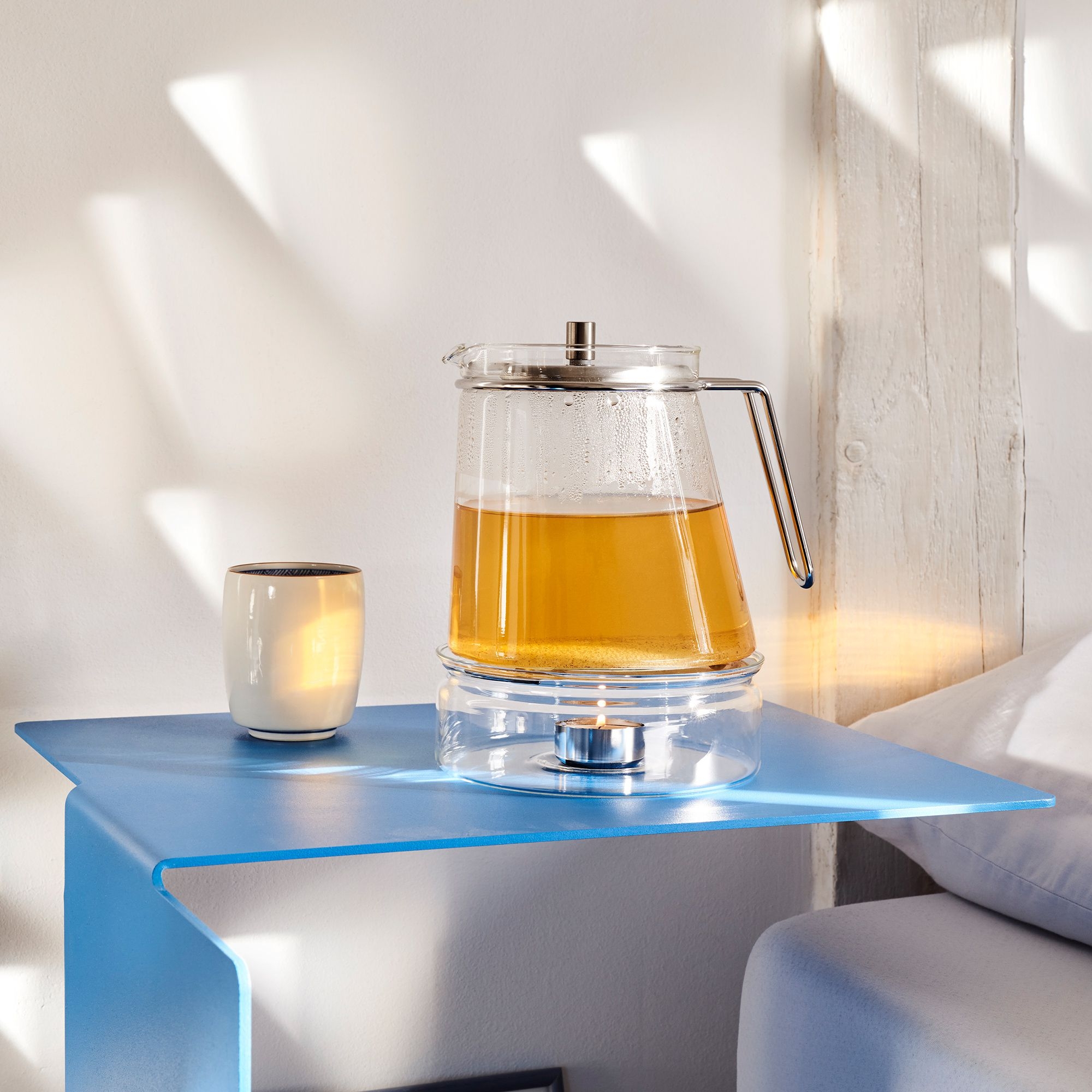 mono - ellipse warmer for tea pot mono - ellipse warmer for tea pot