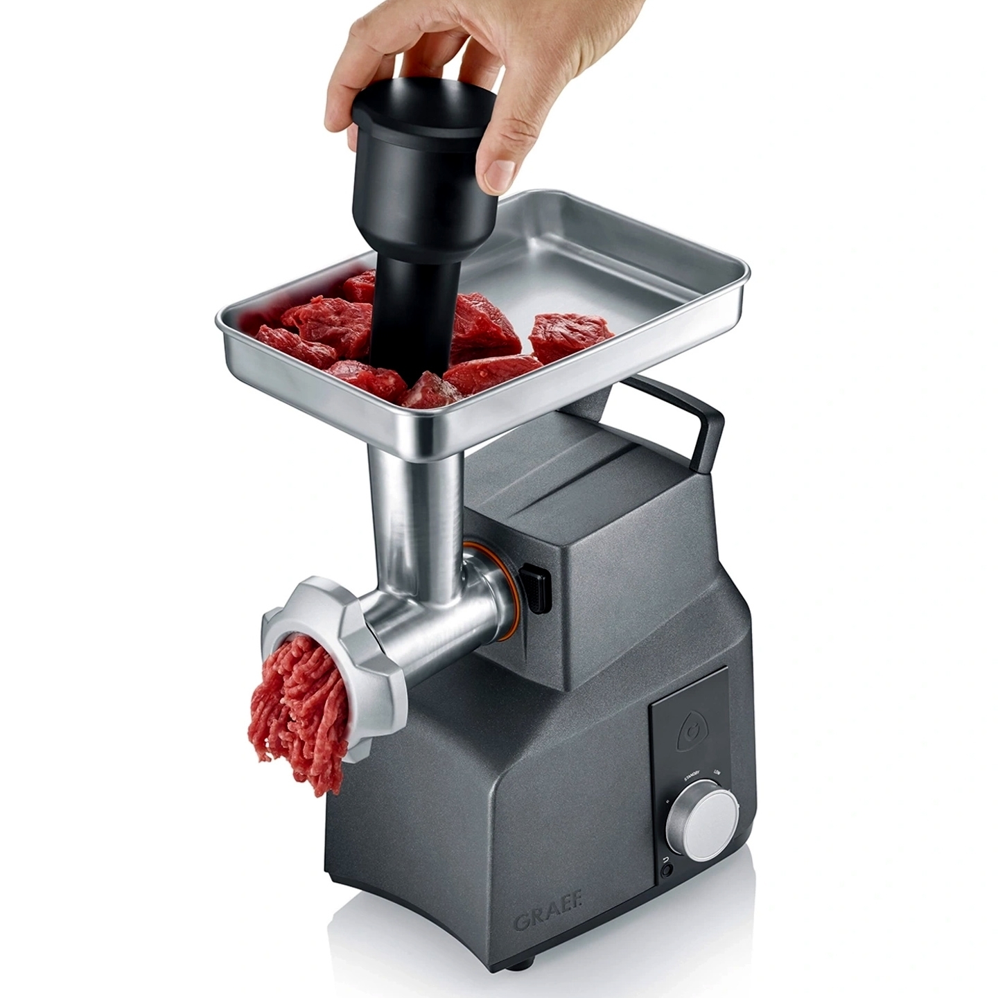 Electric meat grinder mincing fresh meat