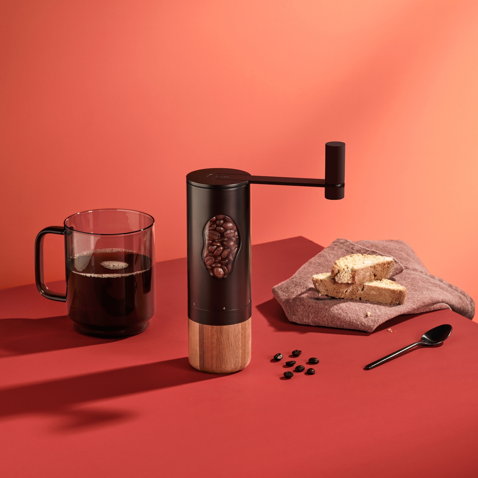AdHoc coffee grinder MRS. BEAN beside iced coffee