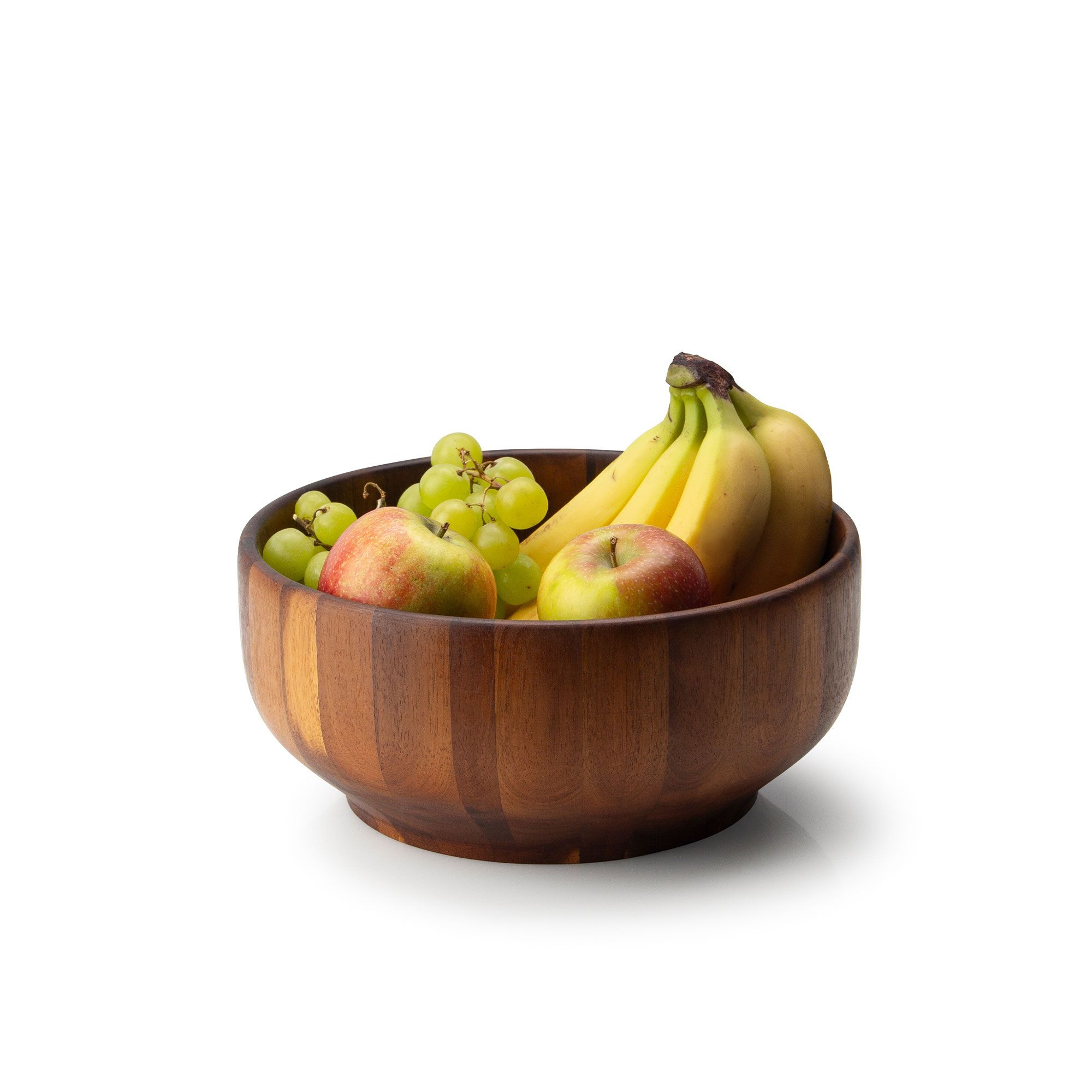 Runde Holzschale gefüllt mit Äpfeln, Trauben und Bananen