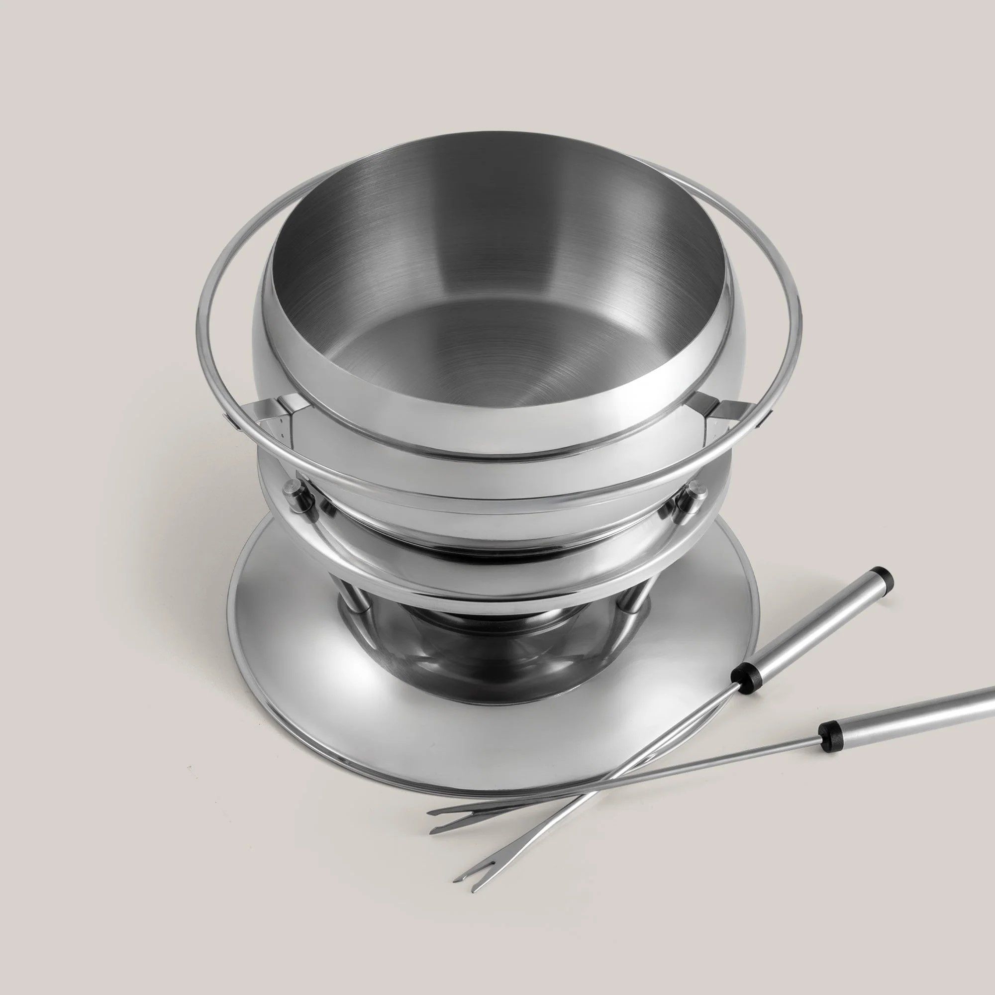 Round stainless steel fondue set with two forks