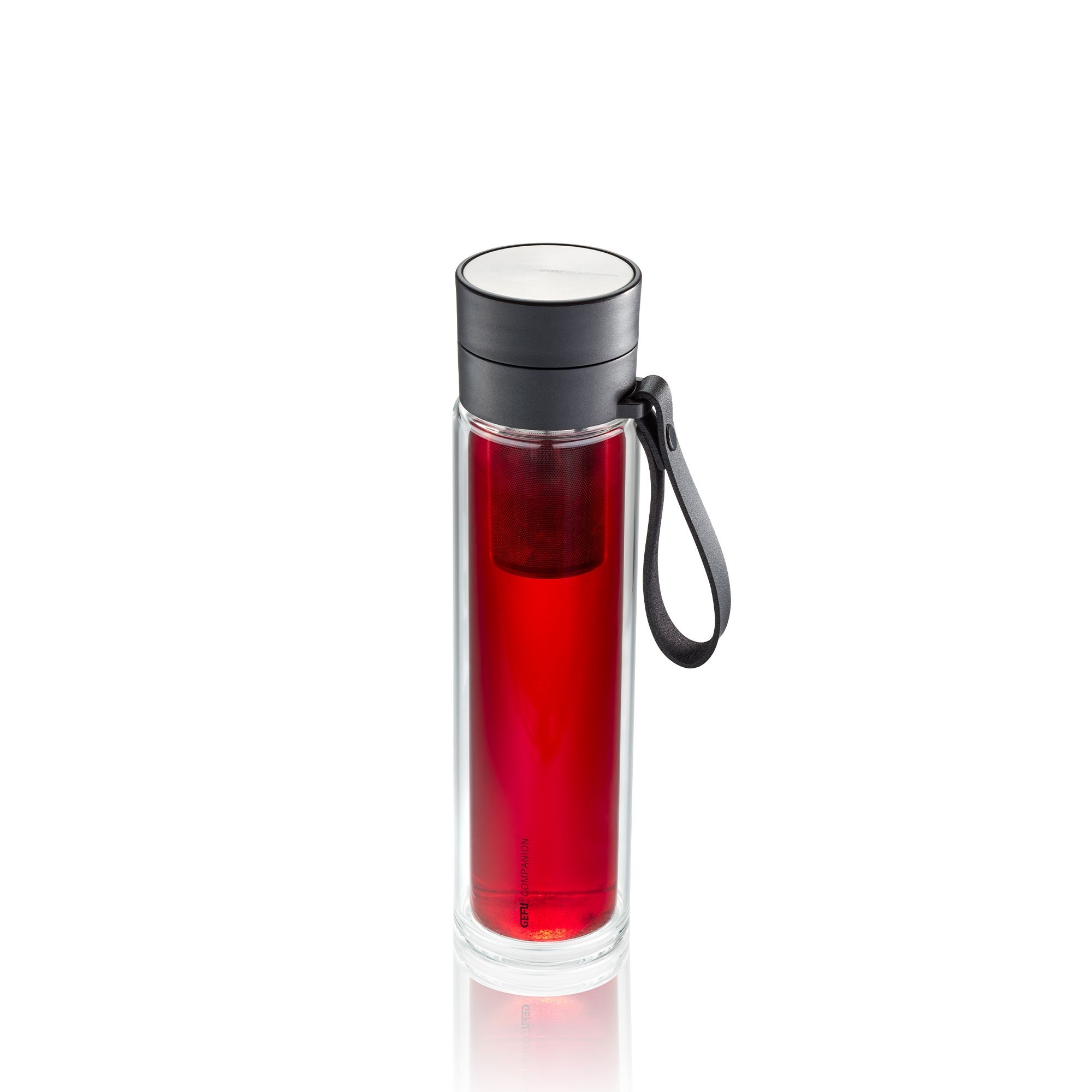 Transparent glass bottle with red drink and strap