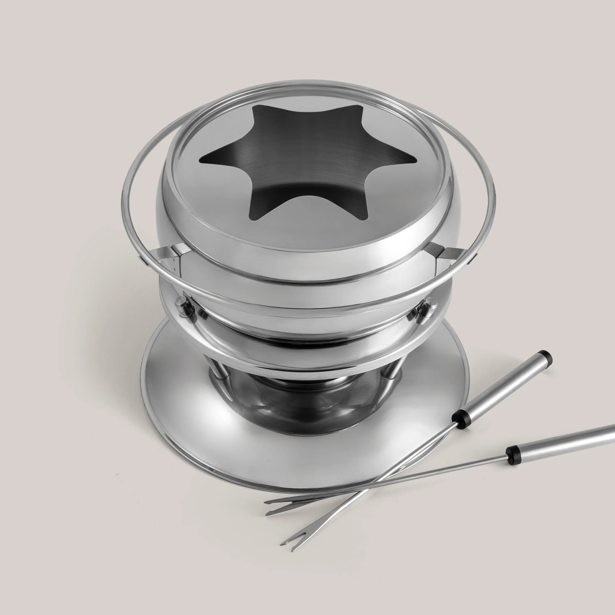 Round stainless steel fondue set with two fondue forks