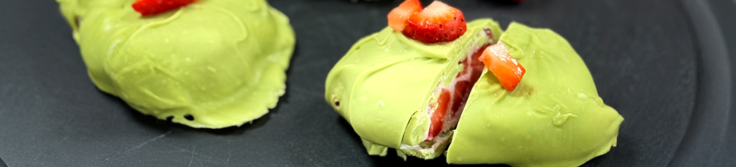 Matcha dessert with strawberries and creamy centre