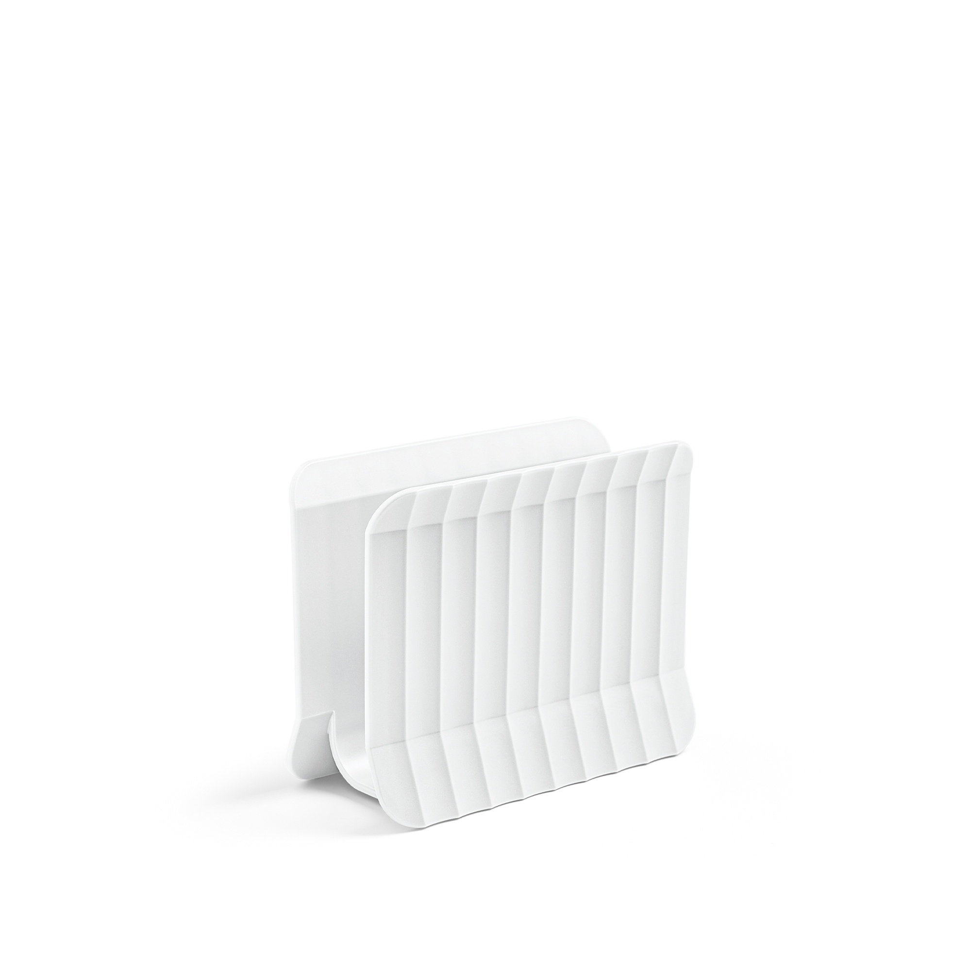 White holder for storing chopping boards