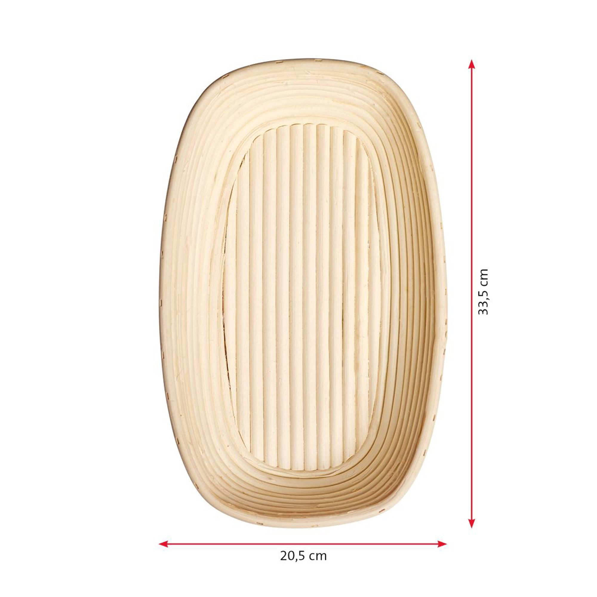 Oval rattan proving basket with loaf of bread