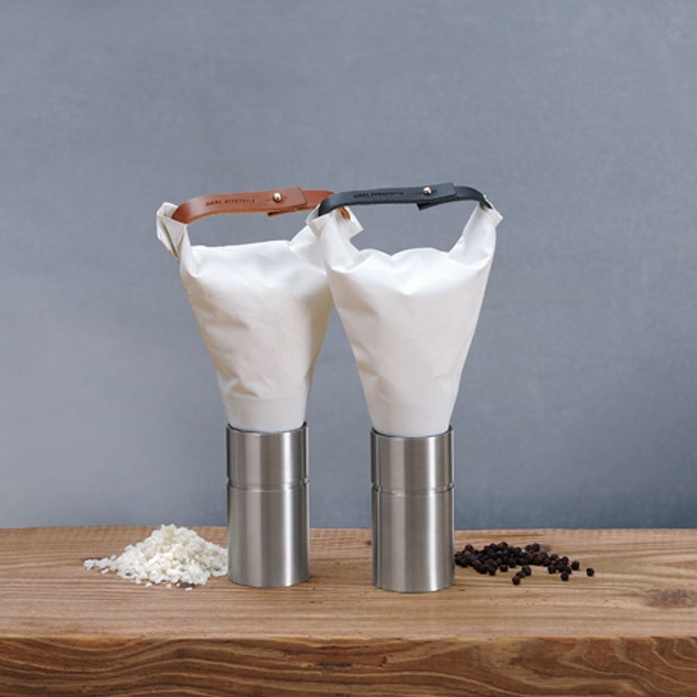 Two stainless steel salt and pepper mills with fabric cover
