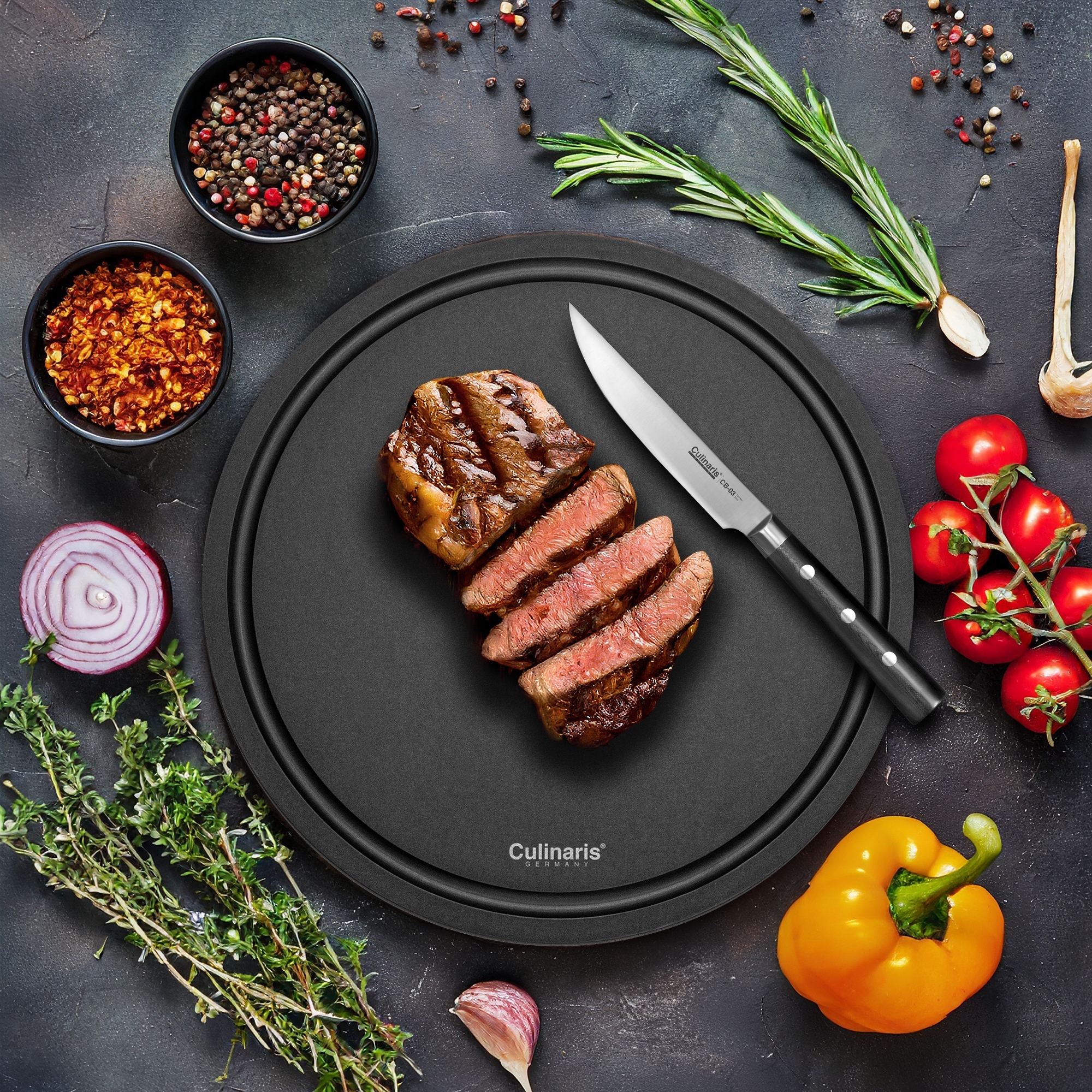 Cutting board NERO - Ø 30 x 0,9 cm + steak knife | Culinaris Cutting board NERO - Ø 30 x 0,9 cm + steak knife | Culinaris