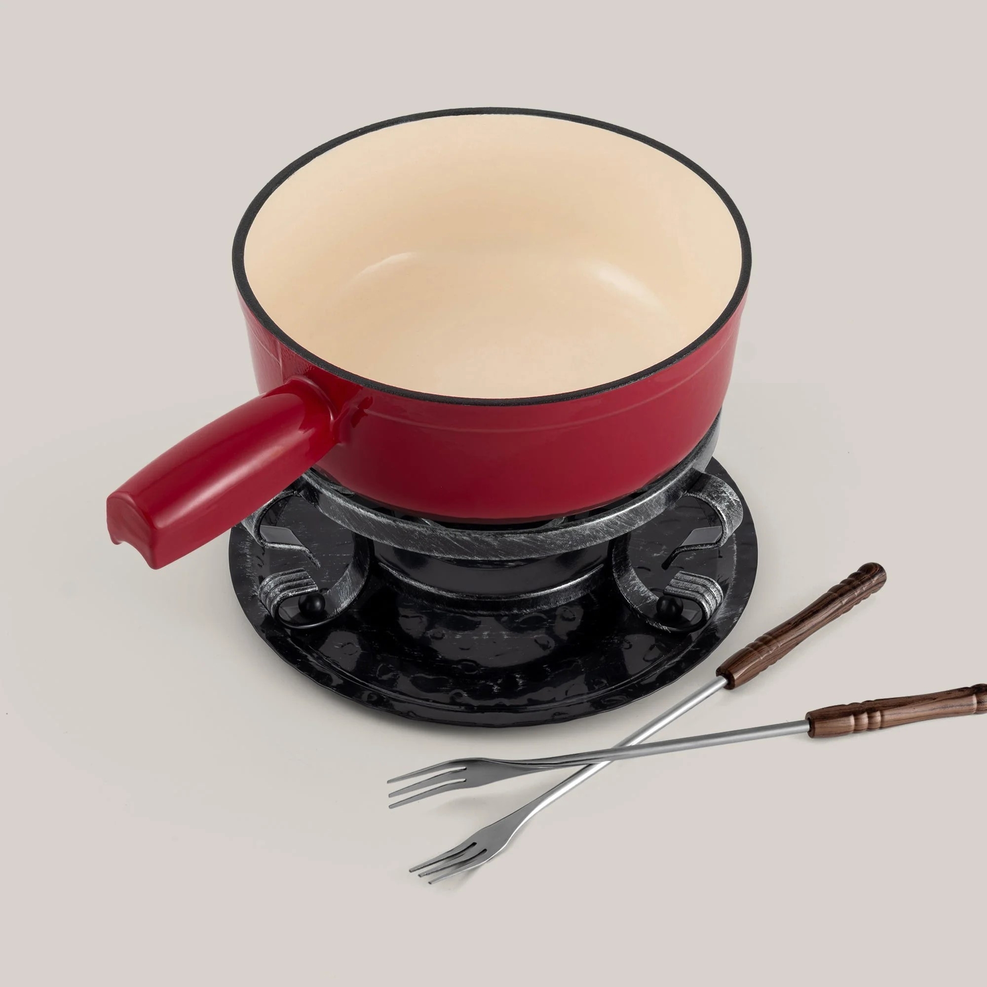 Red fondue set with ceramic pot and forks