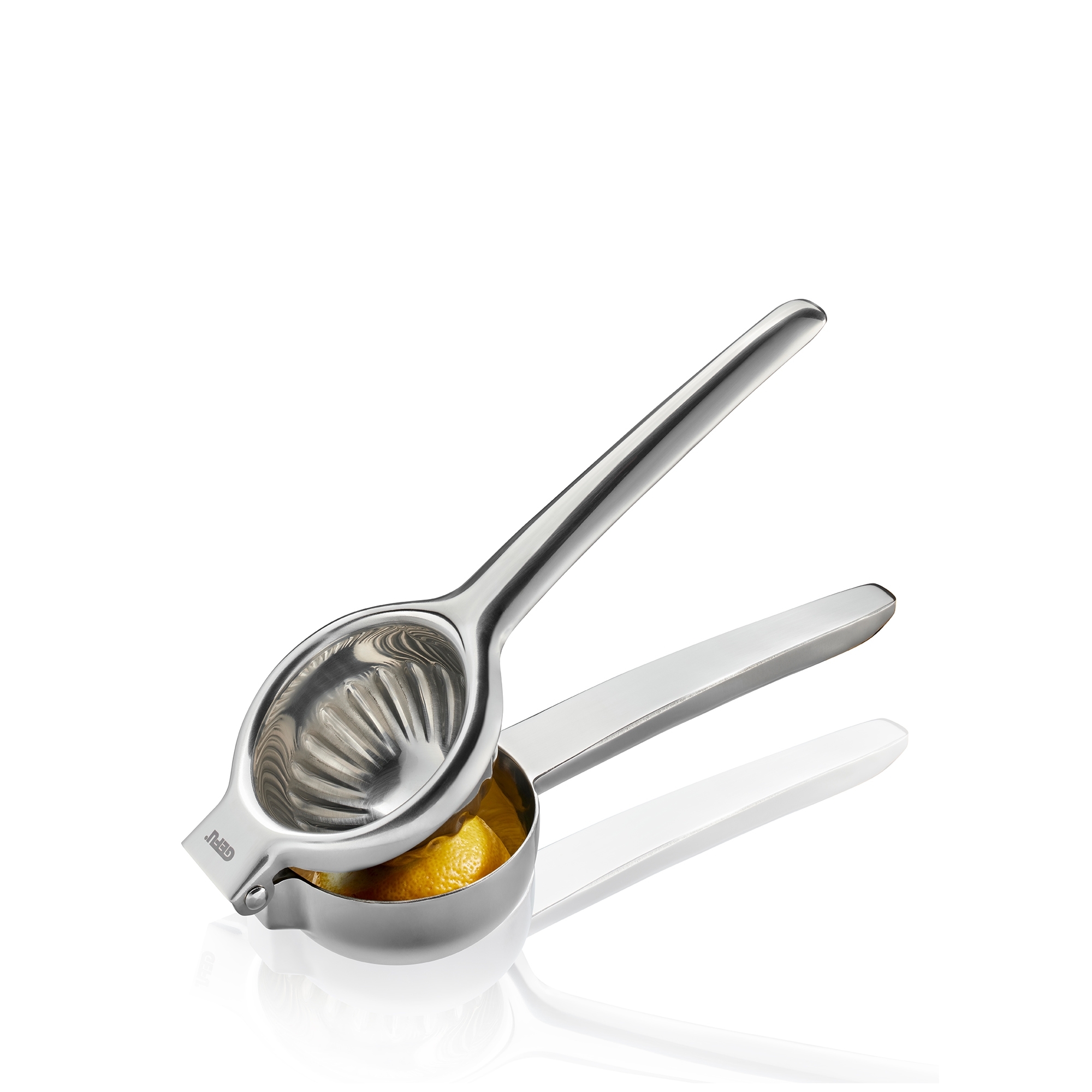 Stainless steel citrus juicer with lemon half for pressing