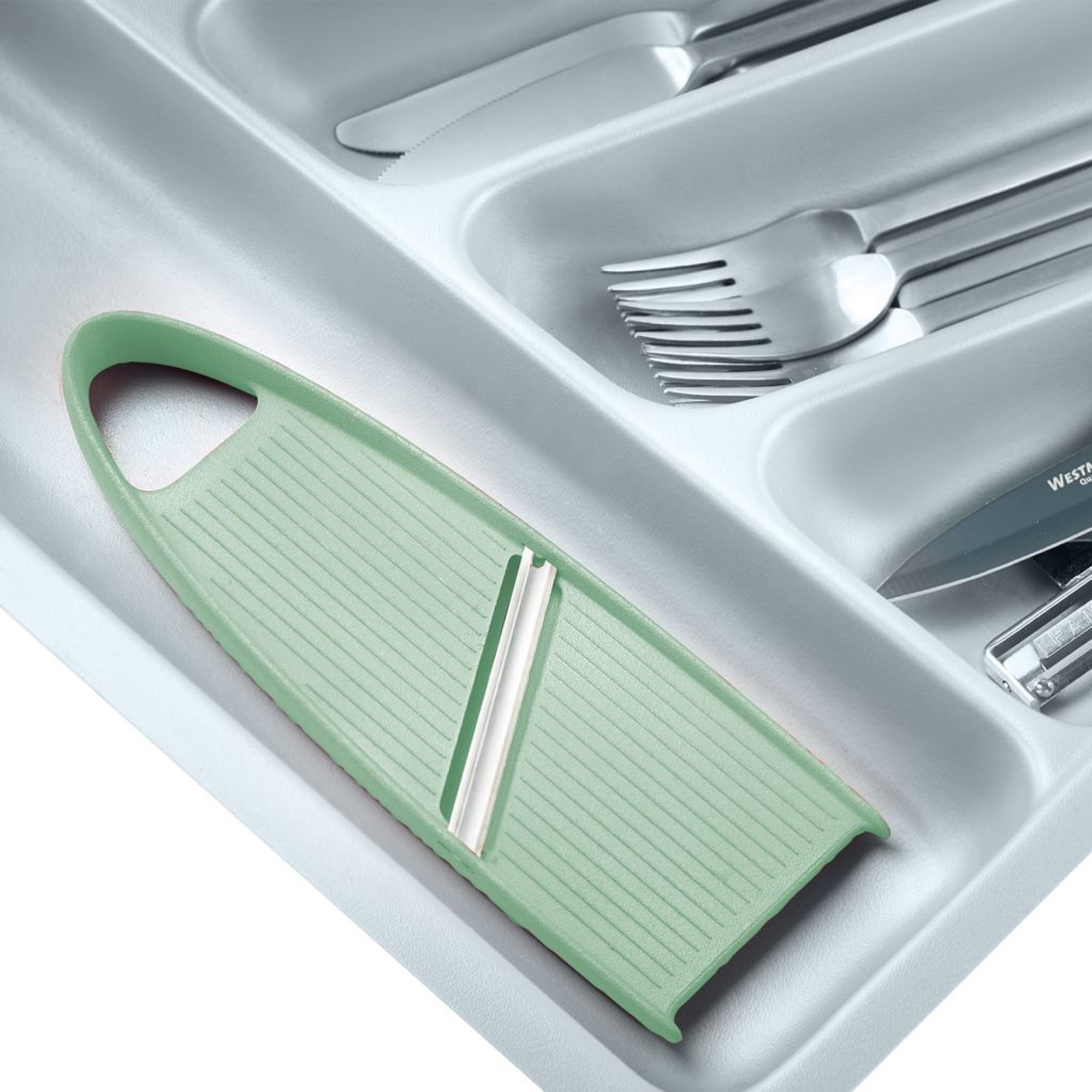 Westmark Hobelix mint-green vegetable slicer in cutlery draw