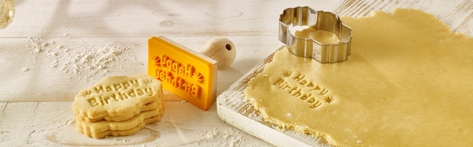 Cookie stamp with cutter and Happy Birthday dough