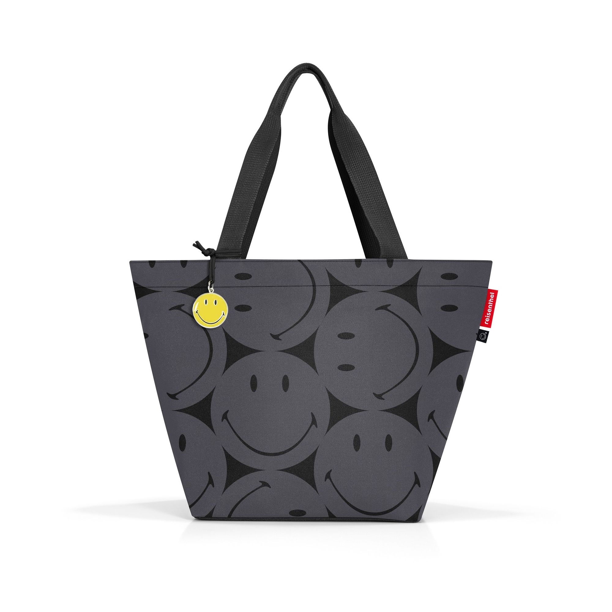 Grey bag with black smiley pattern and yellow charm