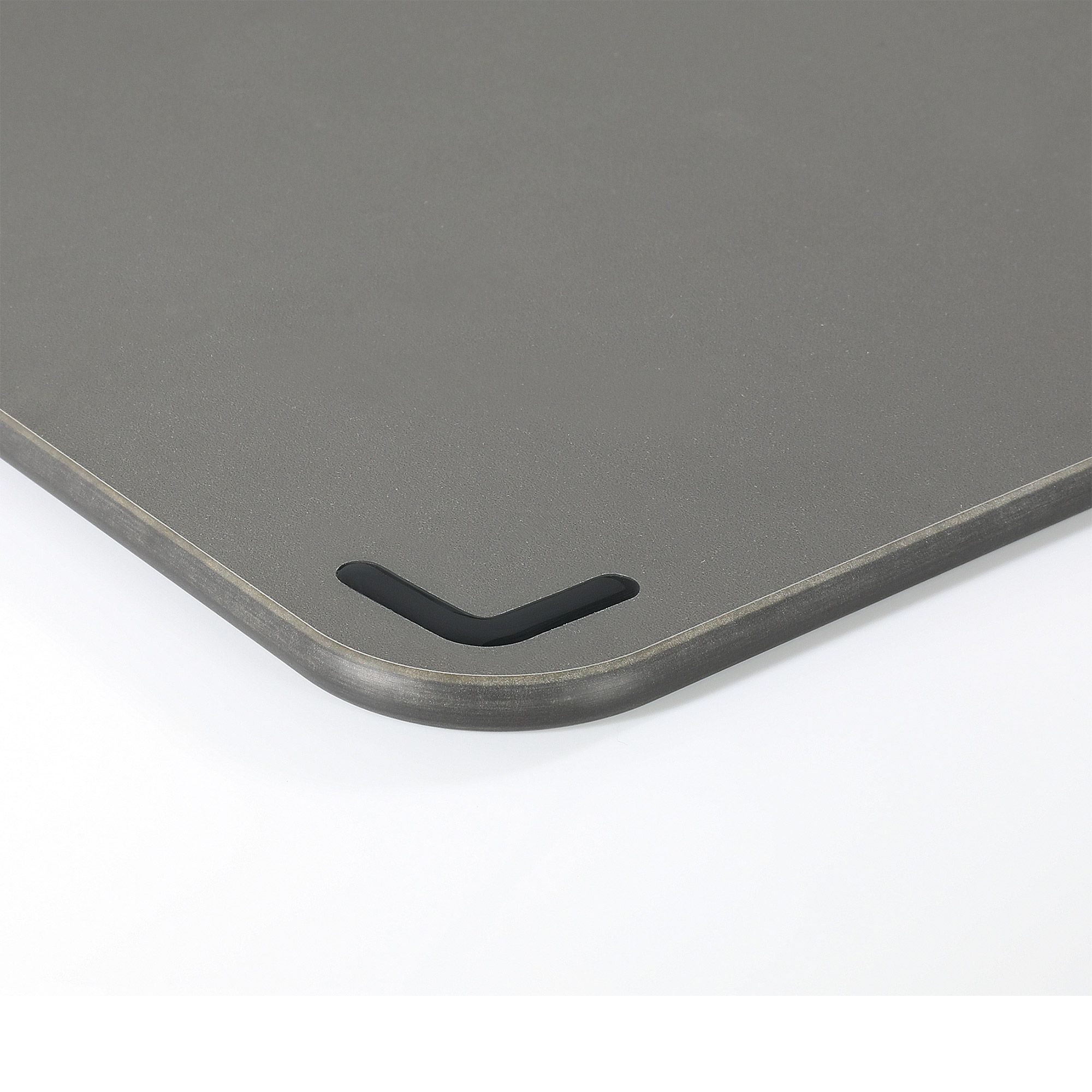 Detail of grey chopping board with non-slip corner