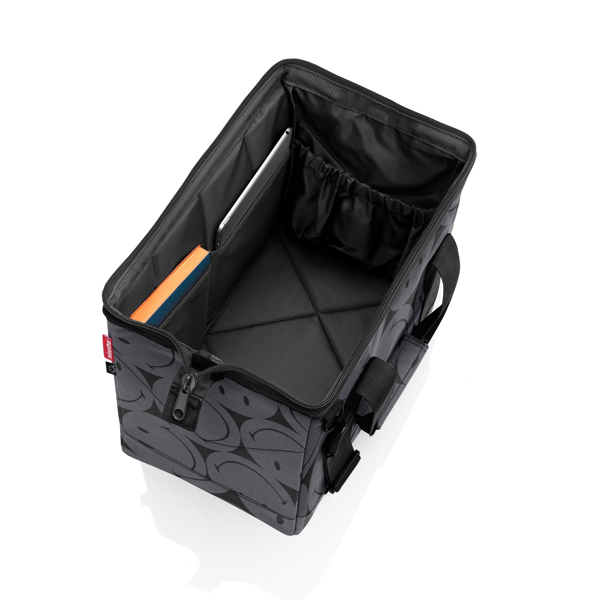 Open foldable bag with inner pockets and books