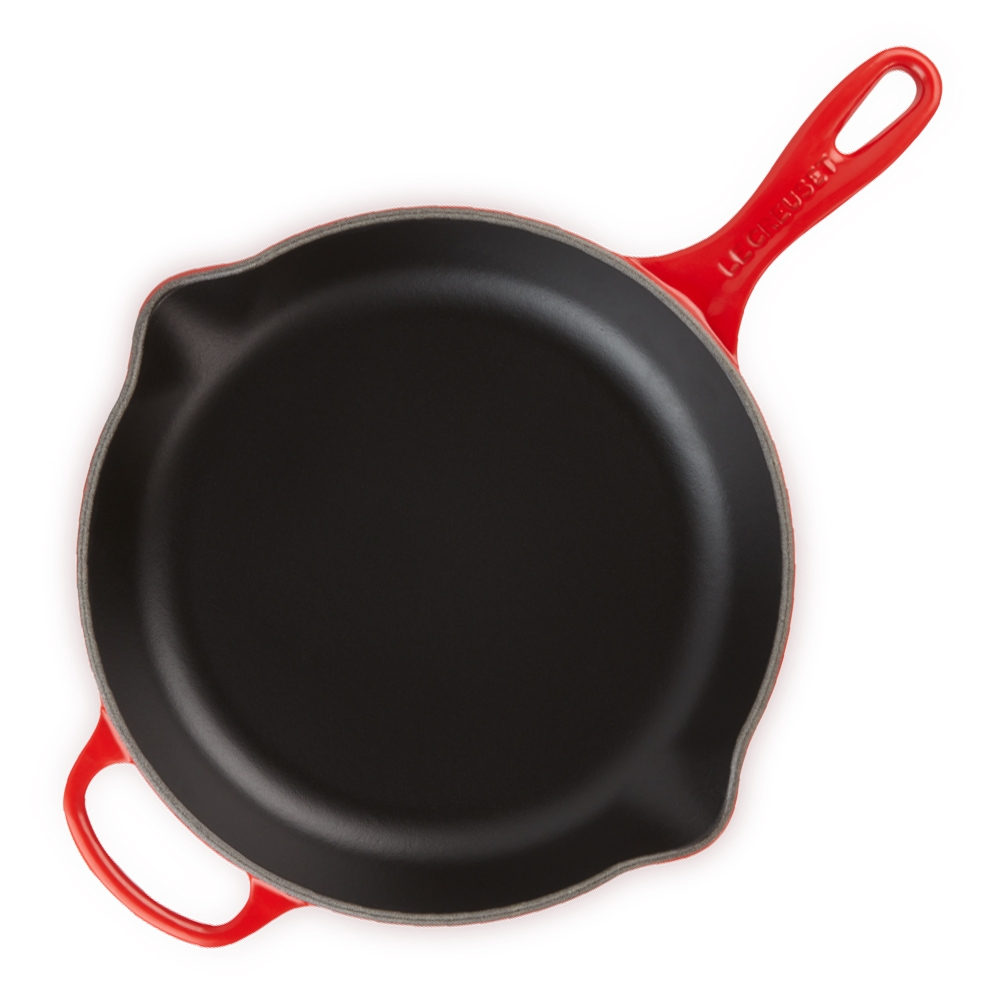 Red cast iron pan with non-stick interior