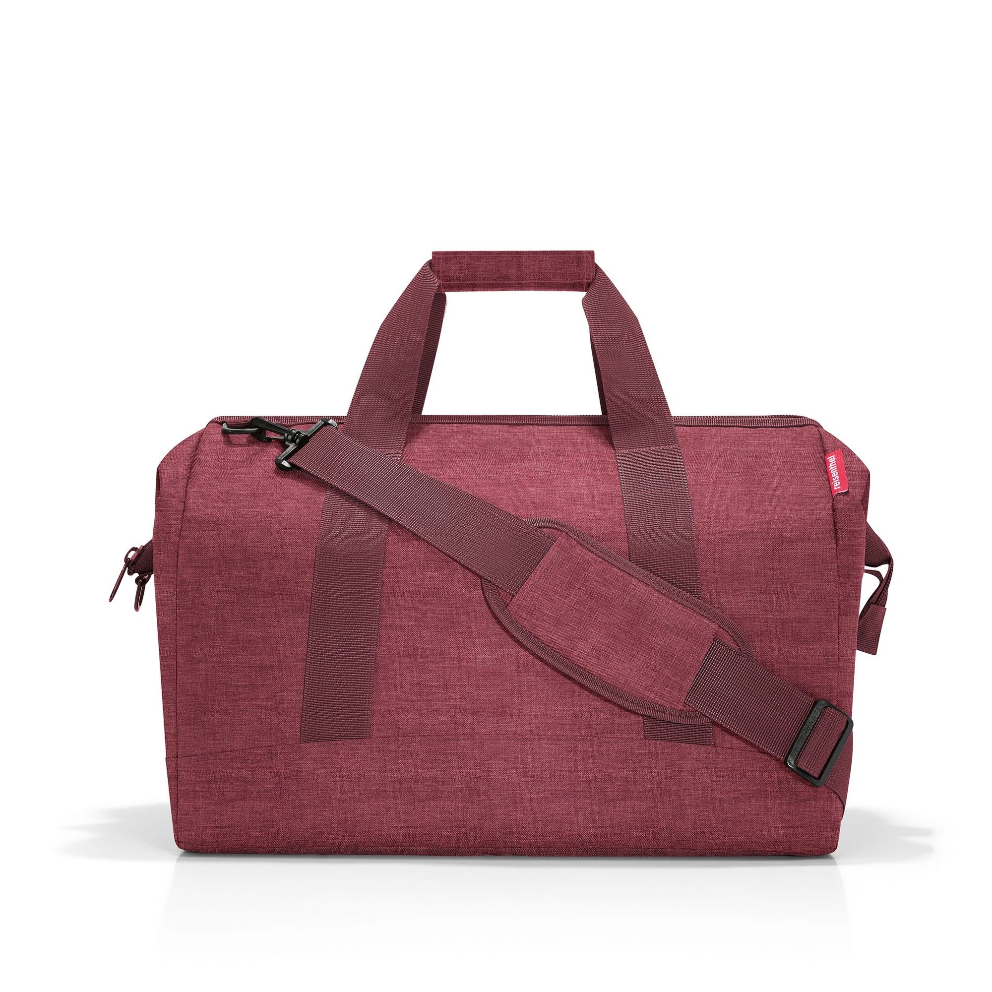 Burgundy travel bag with adjustable shoulder strap