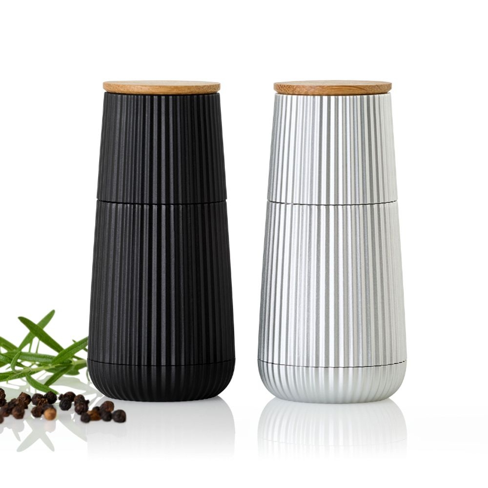 Schwarze und weiße Designmühle mit Holzdeckel