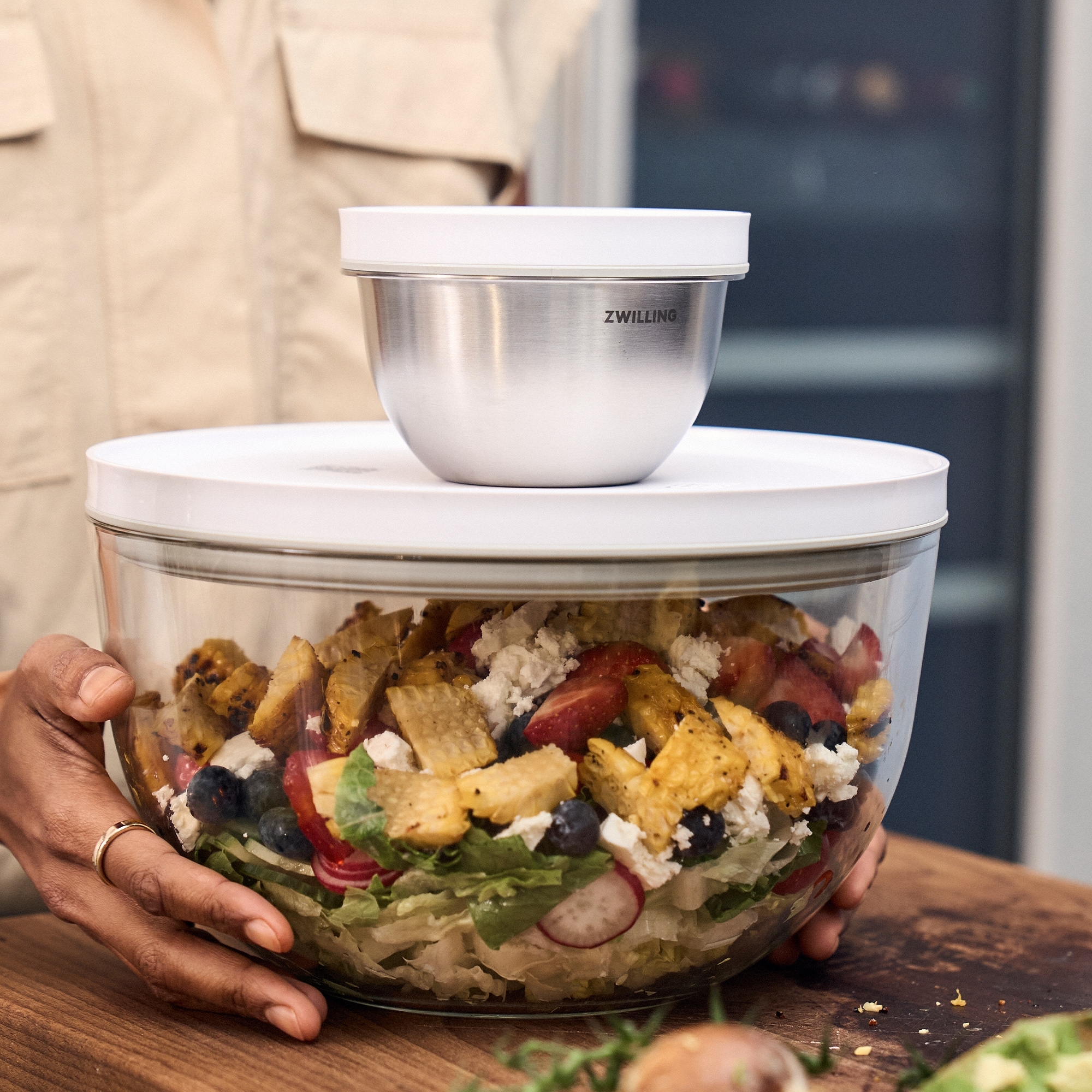 Two ZWILLING bowls with salad and lids