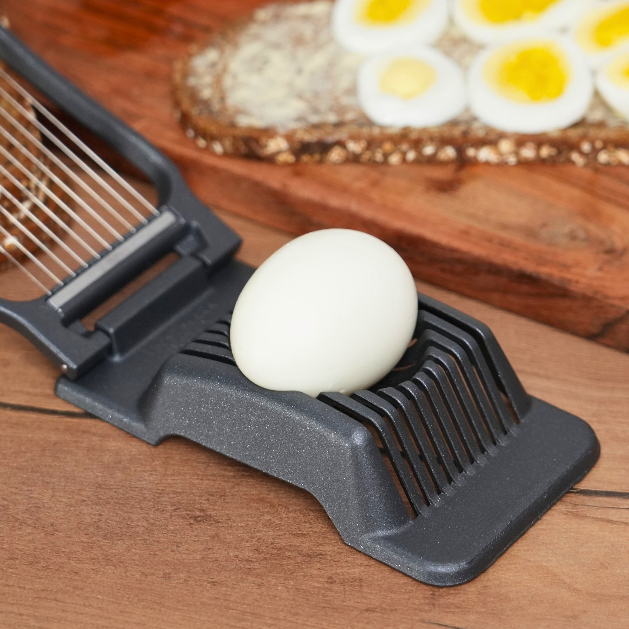 Westmark Duplex Black Edition egg slicer with egg