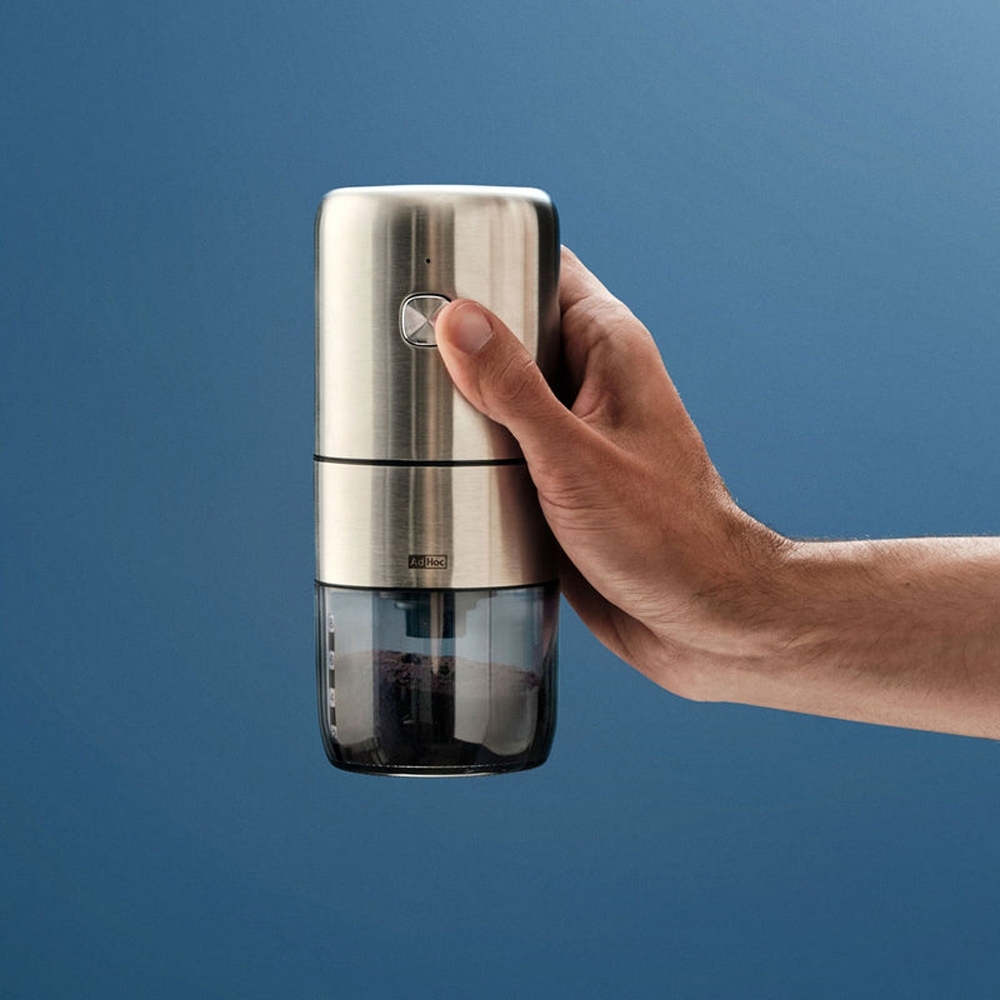 AdHoc i.Mill electric stainless steel coffee grinder in hand