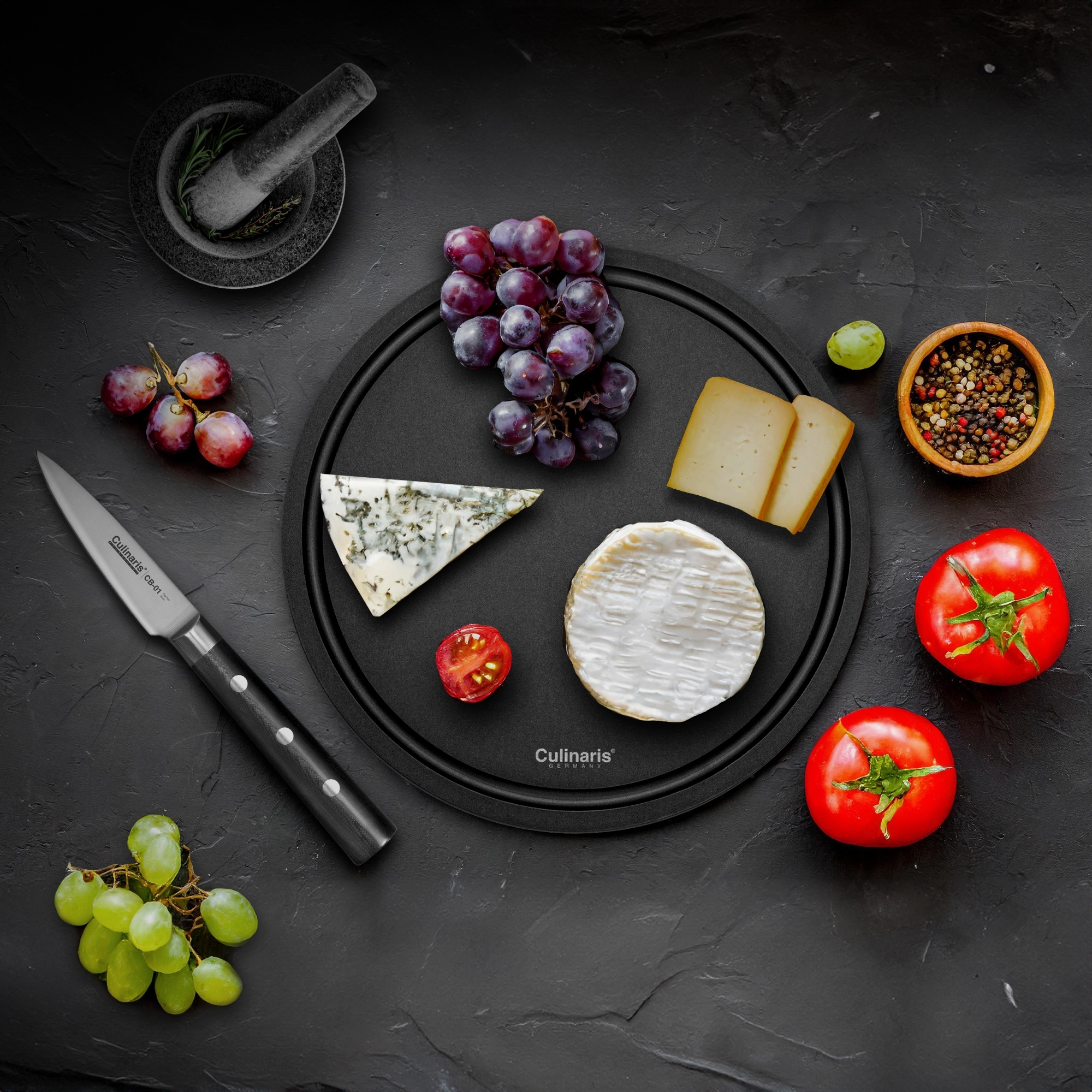 NERO chopping board Ø 30 x 0.9 cm + NEROCURA wood balm | Culinaris