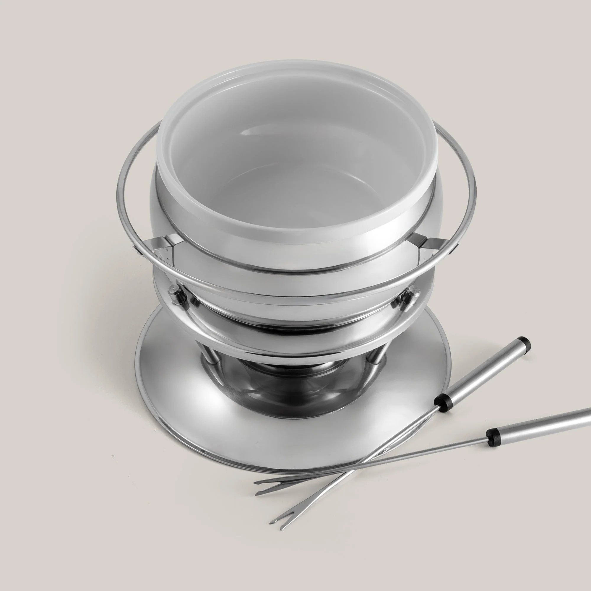 Modern stainless steel fondue set with forks