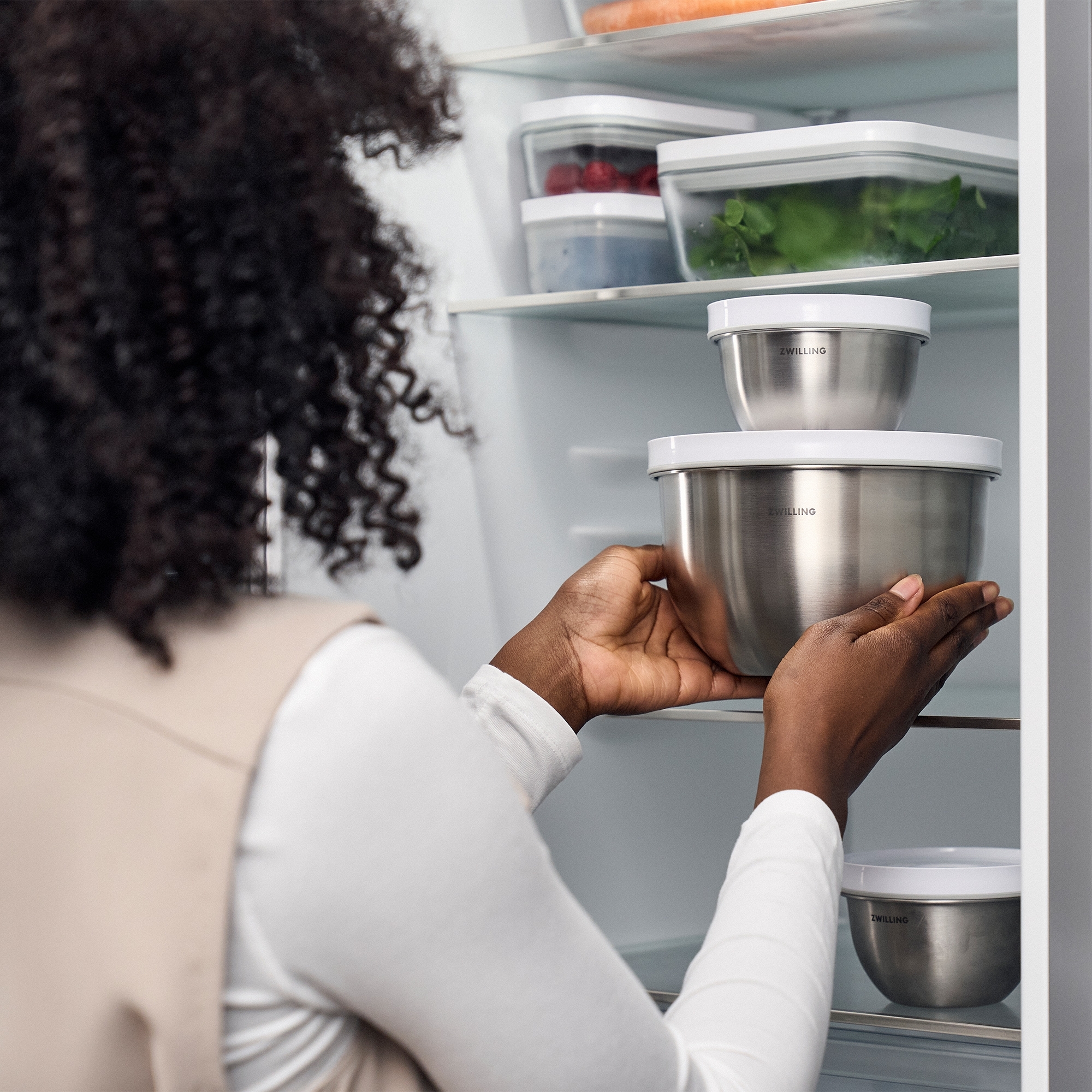 Stainless steel storage containers with lids in fridge